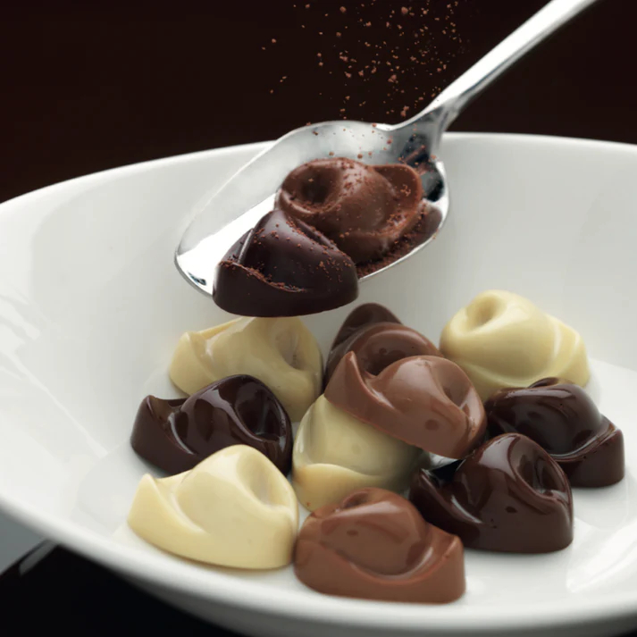 Конфеты шоколадные TORTELLINO из молочного шоколада с начинкой из молочного крема 24 г
